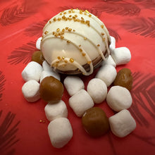 Load image into Gallery viewer, Ralph's Chocolate Delights Gourmet on Red Background Large Hot Chocolate Bombs Size (Approx.): Large 3" x 3" x 3" One Large Hot Chocolate Bombs makes approximately one large cup of hot cocoa A delicious dessert, and addition to dinner parties, Christmas, Holidays, Birthdays, Gifts Ingredients Premium Ghirardelli ChocolateMarshmallowsSalted Caramel Hot Chocolate Mix Caramel Sauce Dulce De Leche