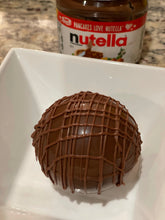 Load image into Gallery viewer, Ralph's Chocolate Delights Nutella Hazelnut Hot Chocolate Bomb Milk Chocolate Hot Chocolate Bomb *Gourmet Large Hot Chocolate Bombs Ingredients Premium Real Ghirardelli Milk Chocolate, Marshmallows, Milk Chocolate Hot Chocolate Mix, Nutella hot cocoa bombs for Halloween, Thanksgiving, Christmas, Holidays, Dessert, parties, Weddings, events and Winter drink or beverage