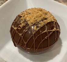 Load image into Gallery viewer, Ralph's Chocolate Delights S'mores Chocolate Hot Chocolate Bomb *Gourmet Large Hot Chocolate Bombs Ingredients Premium Real Ghirardelli Milk Chocolate, Graham Cracker Crumbs, Chocolate Chip, Marshmallows, Milk Chocolate Hot Chocolate Mix, hot cocoa bombs for Halloween, Thanksgiving, Christmas, Holidays, Dessert, parties, Weddings, events and Winter drink or beverage